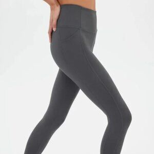 Girlfriend Collective grey compressive leggings with pockets size S